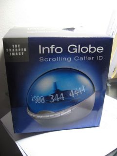 Sharper image InfoGlobe Scrolling Caller ID WI701 NEW Factory Sealed