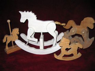 Newly listed SOLID WOODEN 3 DOLL ROCKING HORSES AND 1 CAROUSEL HORSE