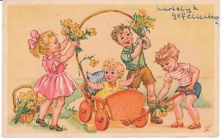 Vintage Postcard Children Decorate Cart Wagon with Flowers Dutch Child 