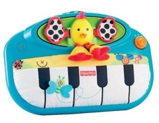   Miracles & Milestones Peek a boo Piano Baby Crib Developmental Toy