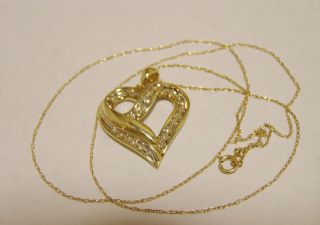 10k Gold 3 stone Diamond Heart Pendant with 18 Chain (1/10 Cttw; I J 