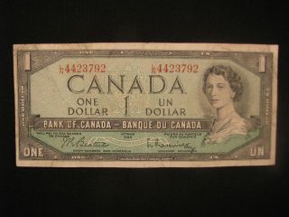 1954 Un One Dollar $1 Bank Of Canada   Serial #L/N 4423792   Beattie 