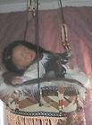 ADORABLE NATIVE AMERICAN BABY LAYING ON A PILLOW DREAM CATCHER