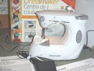 Dressmaker sewing machine with box, electric cord, foot pedal 