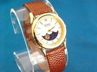   NEW VINTAGE BENRUS 1980S MIDSIZED GOLD TONE MOON PHASE WATCH