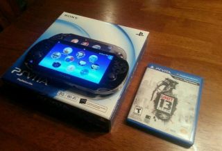 PS Vita w/ 1 game and 32gb memory card