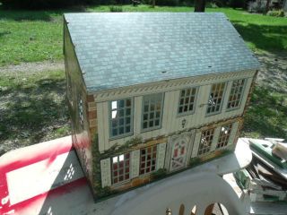   Two Story Dollhouse with Some Furniture, Lithographed, Playsteel