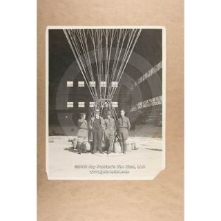 Photo BALLOONS, EQUIPMENT men standing around balloon