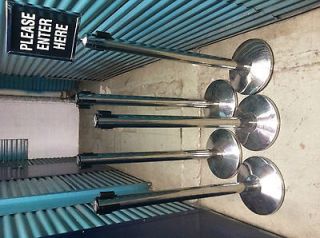 Line Stanchions w/ retractable dividers and line starts here sign