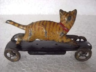 Vintage Big Cat on Wheel Penny Tin Toy
