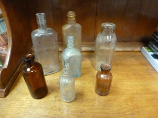 LOT OF 7 ASSORTED VINTAGE GLASS BOTTLES,LYSOL.LISTERINE,UNIVERSAL,NO 