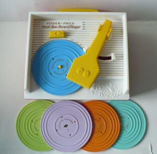 FISHER PRICE RETRO MUSIC BOX RECORD PLAYER WITH 5 RECORDS 2010