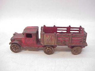 ANTIQUE AC WILLIAMS CAST IRON TRUCK STAKE TRAILER toy