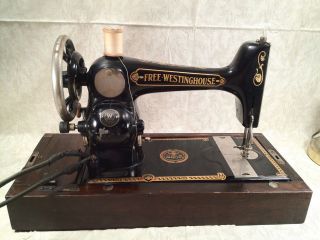 Free Westinghouse Sewing Machine with Wood Case and Attachments