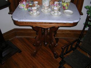 antique victorian walnut marble top parlor table, nice base scalloped 
