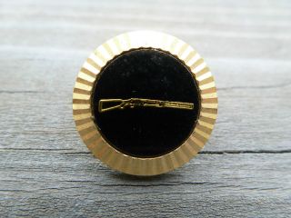 Military Rifle Gold Gun with Black Background and Gold Edging Round 