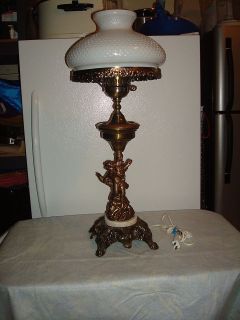 brass cherub lamp in Collectibles