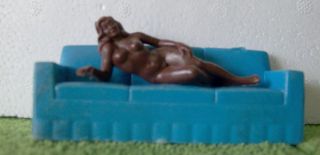 Marx Brown Bathing Beauty laying on side   