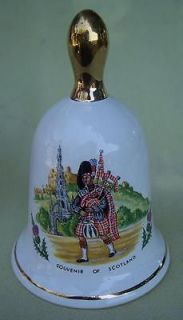 CHARMING CHINA BELL FROM SCOTLAND  BAGPIPER AND CASTLE AND CREST  GOLD 