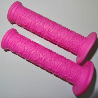 Schwinn Logo Handlebar Grips in Pink a pair with flanges