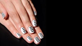 Sephora obsessed nails showing off our stripes.