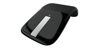 Buy Arc Touch Mouse   scroll with the touch strip, then tap to stop 
