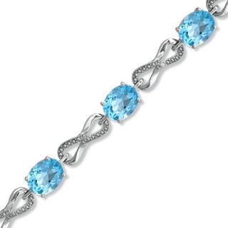 Oval Blue Topaz and Diamond Accent Knot Bracelet in Sterling Silver â 