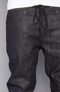 The K Skinny Chad Muskas Signature Denim in Raw Blue