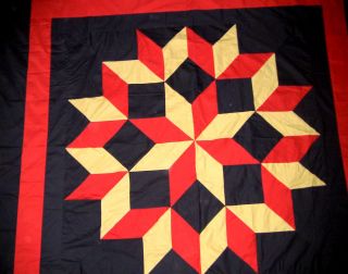 handmade amish styled broken star with a bold graphic look quilt top 