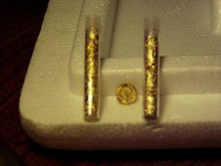 Newly listed 2 TUBES OF GOLD FLAKES AND 1 MINI ST. GAUDENS COIN