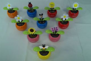 10 assorted flip flap solar flowers lot a one day