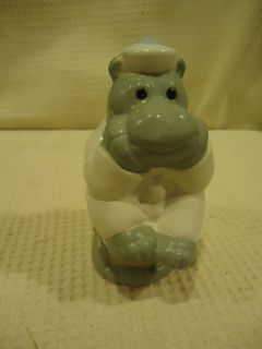 plastic toy bank hippopotamus dressed as sailor 