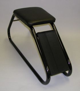 one shoe fitting stool with black padded seat black time