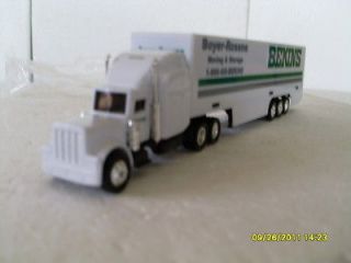 BEKINS 1/87th DIE CAST TRACTOR AND PLASTIC TRIPLE AXLE TRAILER