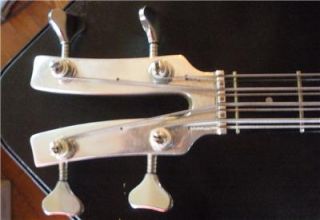   tuners in the scalloped edge on the end. Features a Badass bridge