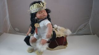   Goldenvale Porcelain Indian Baby Doll with Velvet Drum Mallet