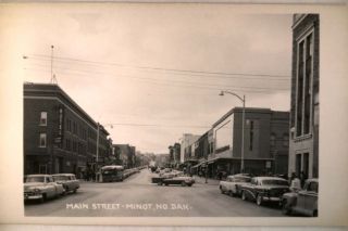 1950s rppc CARS AT HOTEL & STORES ON MAIN STREET   Minot North Dakota 