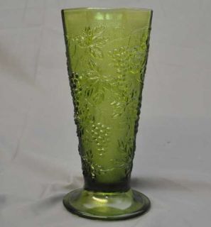 vintage green glass vase footed with a grape leaf looks like the 