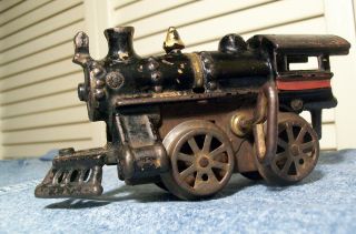   antique cast iron windup toy locomotive engine this toy train was made