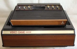 Atari 2600 Game Console Center with 4 Controllers and 18 Games incl 