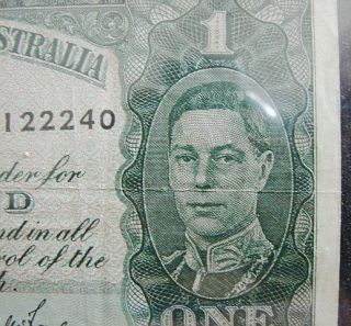 1942 AUSTRALIA WW2 ONE POUND BANKNOTE. CONDITIONPOOR, NOTE# H/20 
