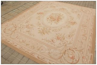 What a casual and antique looking small aubusson rug piece