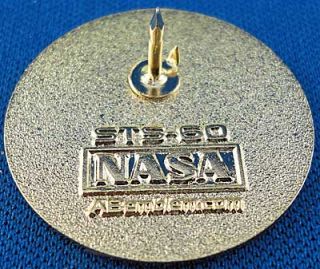 This pin and patch are made by AB Emblems, the NASA Contractor for 