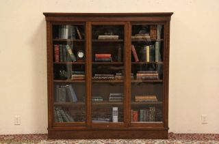 Oak 1900 Antique Bookcase 3 Sliding Wavy Glass Doors