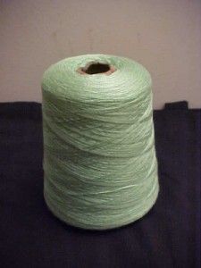 This is a cone of Bramwell Silky Light Green Machine and Hand Knitting 