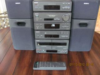 Sony remote controlled cd player, radio, dual cassette boombox with 4 