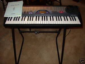 CASIO electronic keyboard & stand (61 piano style keys)