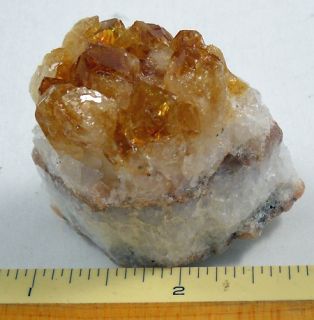here over 100 varieties of tumbled stones citrine cluster