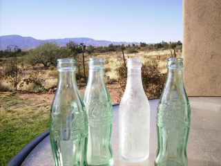  Five Vintage Coke Bottles