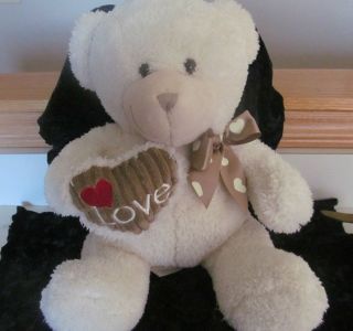 dan dee collectors bear off white in color with brown heart on chest